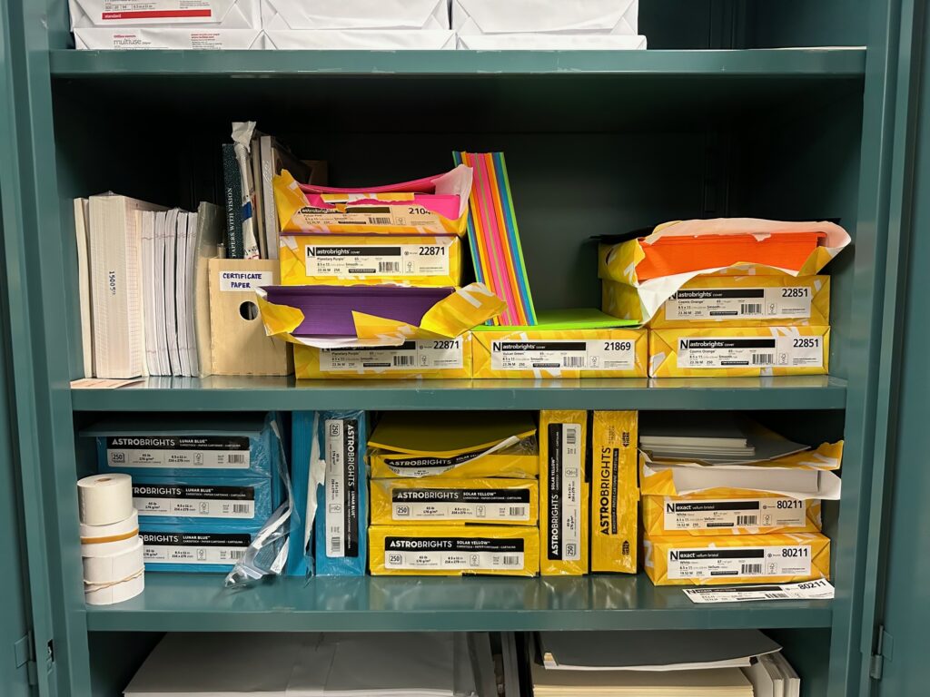 Prep hub supplies including assorted paper.